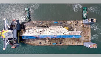 Raised South Korean ferry Sewol arrives at port for search