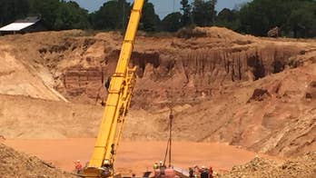 2nd body of 2 missing workers found in gravel pit