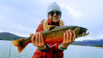 Woman catches record-breaking fish in Colorado on her vacation