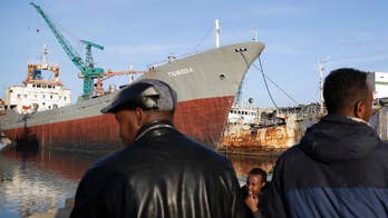 The Latest: EU official says migrant deal will protect lives