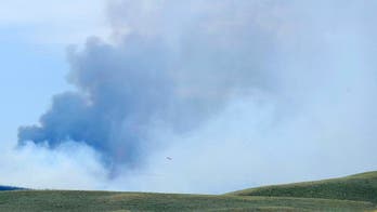 Colorado firefighters battle wildfire to a standstill