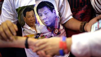 Philippines won't confront China on weapons in disputed sea