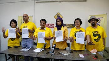 Malaysian reform group office raided ahead of rally, 2 held