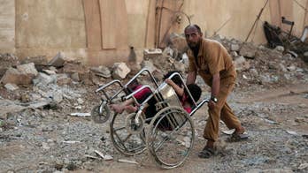 Iraqi forces move to surround Mosul's Old City, held by ISIS