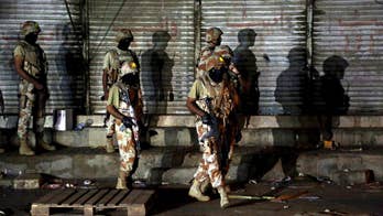 Official: Roadside bomb kills 9 people in northwest Pakistan