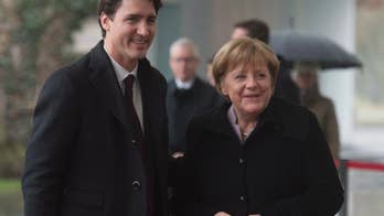 Merkel: Germany will raise defense spending, but slowly