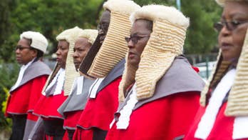 In wigs and robes, Zimbabwe judges evoke British colonialism