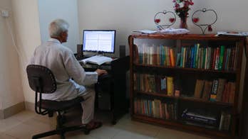 Bangladesh professor under 24-hour armed guard after threats