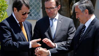 AP Explains: Rival Cyprus leaders talk land in Switzerland