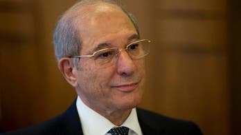 The Latest: International probe of sarin attack underway