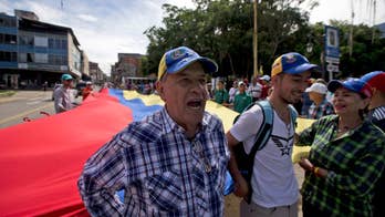 Maduro's foes march across Venezuela to demand recall vote