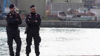 Italy navy recovers 2015 migrant boat, hopes to ID victims