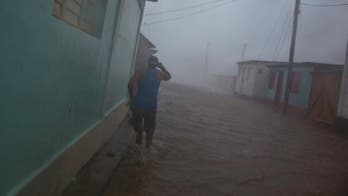 The Latest: Hurricane warning issued for the Bahamas