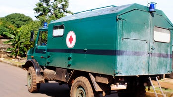 Mistrust and machetes thwart efforts to contain Ebola in Guinea