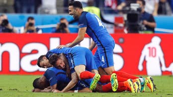 France wins in peaceful Paris, but more trouble in Marseille