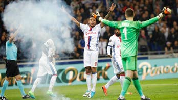 Lyon players attacked by fans in Bastia