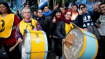 Argentina's big unions join to protest layoffs, inflation