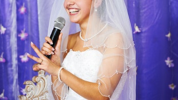 Bride sings Elvis down the aisle, groom breaks down in tears