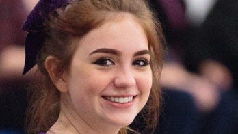 Veteran who received teen's kidney stands with family at memorial