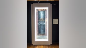 Door from Walmart founder's first store to be donated to the Smithsonian