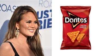 Model Chrissy Teigen defends her habit of licking Doritos dust