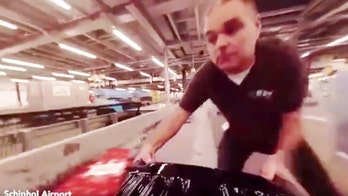 What really happens to luggage at the airport? Suitcase camera reveals all