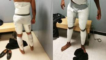 2 passengers on same flight busted wearing cocaine pants