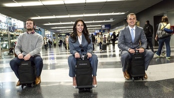 Sick of walking through long airport terminals? Just ride on your suitcase