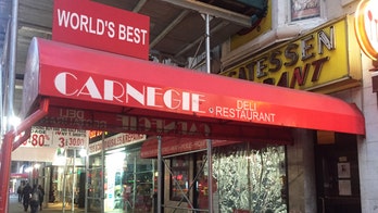 End of an era: Carnegie Deli's famous faces left on street