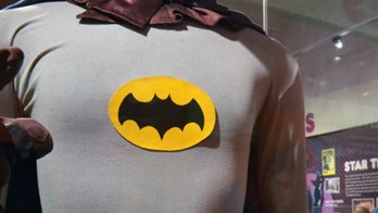 Police searching for man who allegedly stole beer wearing a Batman suit