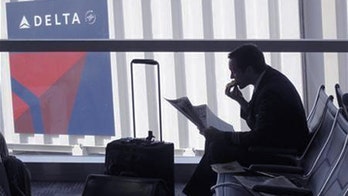 Delta tries to lure business travelers with travel credits