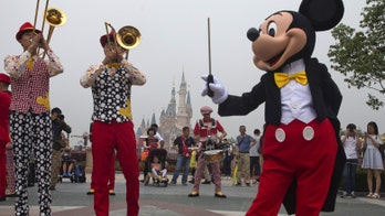 Shanghai Disney opens to huge crowds despite rain