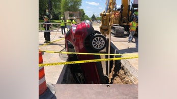 Driver unhurt after car nosedives into ditch