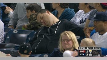 Yankees fan caught sleeping suing ESPN for $10 million