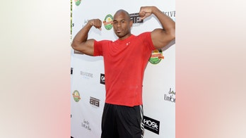 Ex-WWE star pins down alleged robber until police arrive