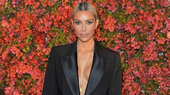 Kim Kardashian poses nude in glitter with silver hair