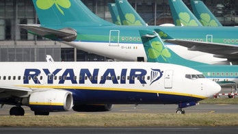Late passenger runs across the tarmac to catch flight