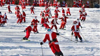 Dozens of skiing Santas hit the slopes in Maine to raise money for charity