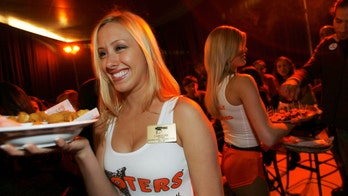 Hooters rolling out more conservative uniforms for servers in Asian restaurants