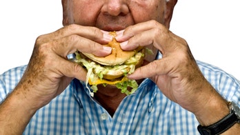 Picture of lonely grandpa eating burger after grandkids ditch dinner goes viral