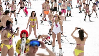 Scantily clad skiers attempt to break world record in Sochi