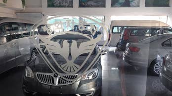 At a Pyongyang car dealership, only the logos are local