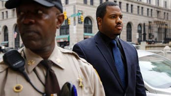 Baltimore officer awaiting trial takes stand against Freddie Gray van driver