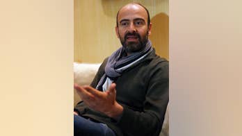 Syrian musician in limbo after travel ban