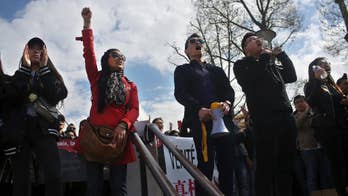 Thousands gather in Paris over police killing of Chinese man