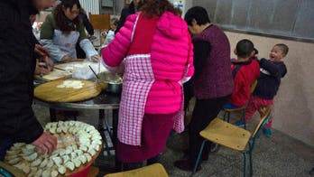 Chinese Lunar New Year feast begins with drums and dumplings