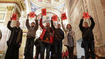 Hundreds rally against Russian cathedral handover plans