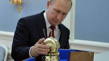 Putin plays up Russia-US cooperation in space