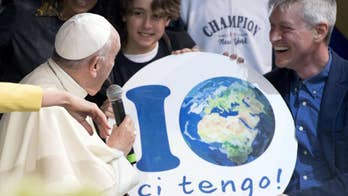 Pope makes surprise visit to Rome park marking Earth Day