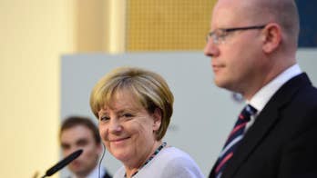 Germany expects fewer than 300,000 refugees this year